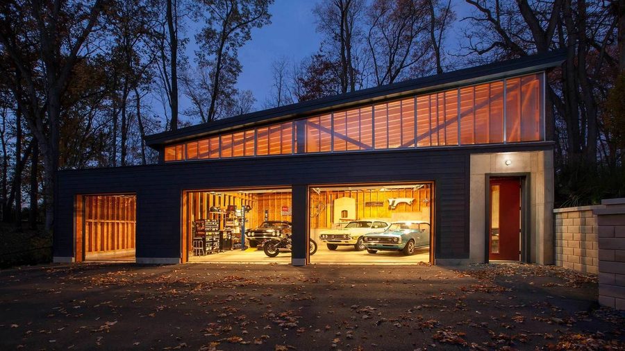 Detached three-car garage with stone trim